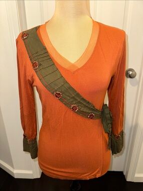 Cordelia Rust Color V-Neck Tunic with Olive Trim and Embellishments.